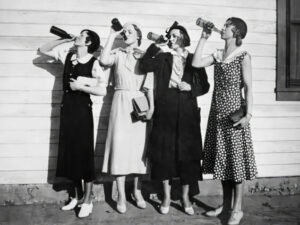 Women Drinking from Bottles, women, drinking, bottles, vintage photography, black and white, 1930s, humorous, candid, friends, fashion, quirky, retro, feminist, beer, bar art