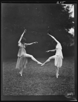 Modern Dancers Duet, modern dance by Arnold Genthe, dancers, duet, performance, movement, ballet, expressive, vintage photography, grace, minimalism, black and white, figurative