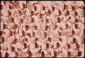 Women at Saviours' Day 1974, crowd, people, documentary photography, vintage photography, group portrait, community, ceremony, candid, historical, culture, religion, black, african american
